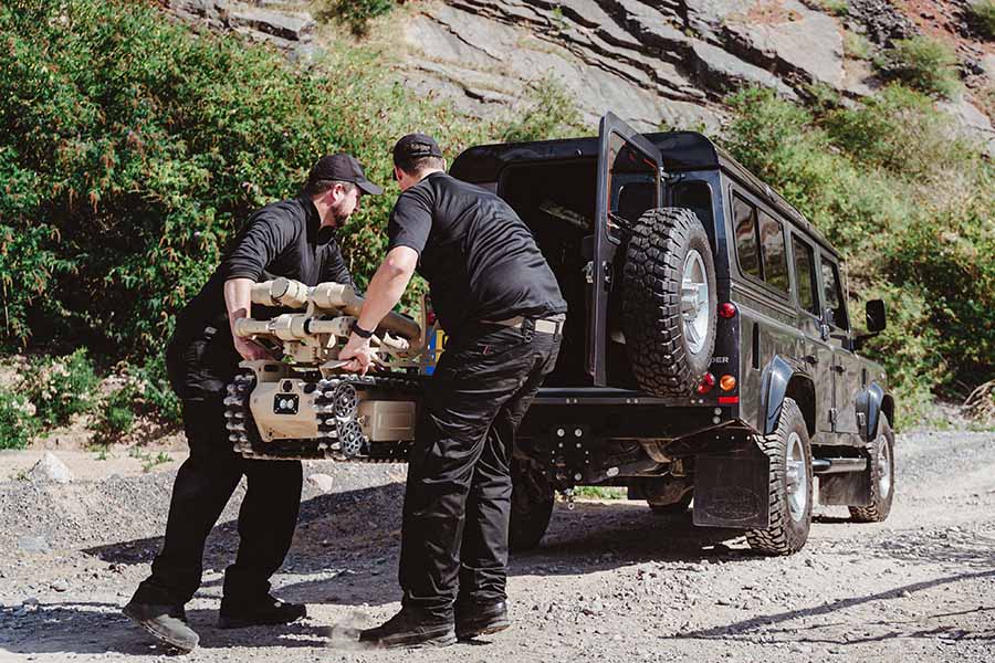 Unloading T4 robot from SUV