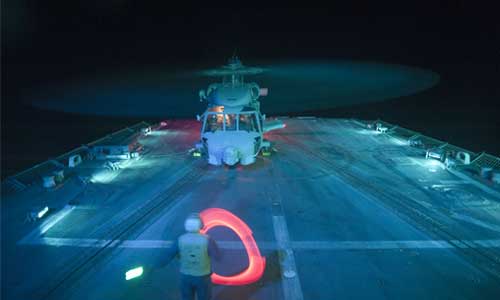 Rendering of helicopter landing on ship with projection mapping capabilities  (Photo by Mass Communication Specialist 3rd Class Jeff Atherton)