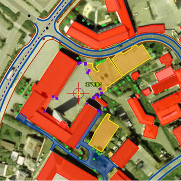 Resulting DEM and planimetric feature map derived from stereo aerial image data.