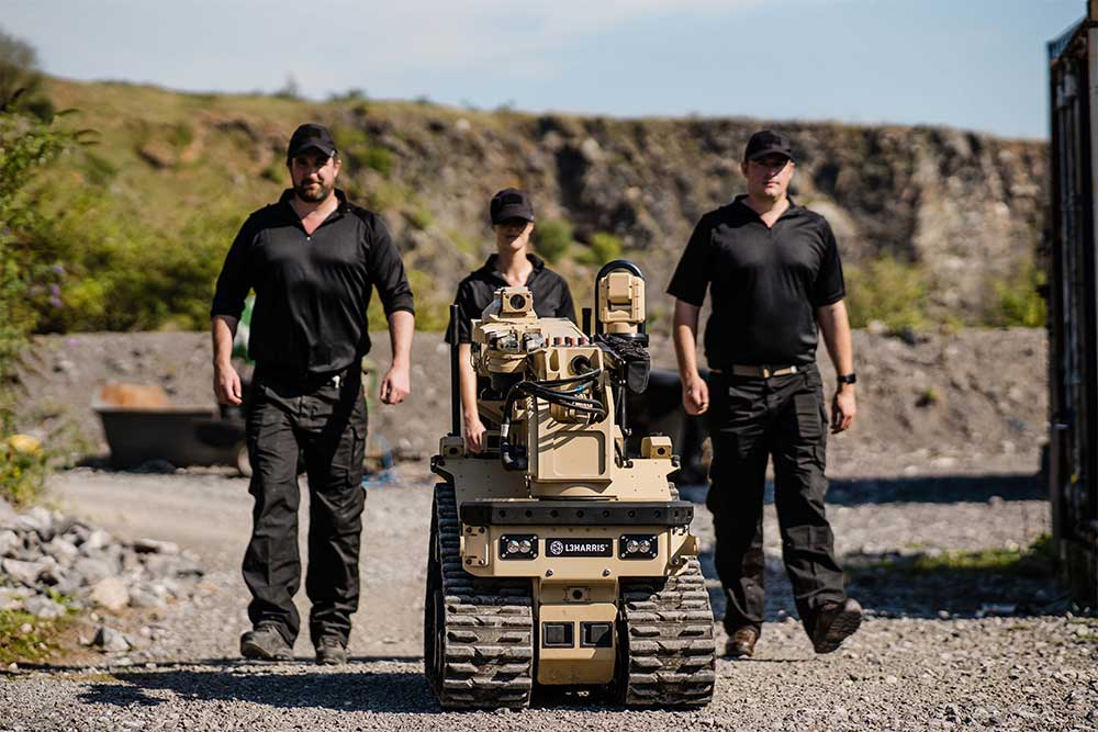 L3Harris robotics system walked by handlers