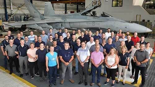 The L3Harris Canadian ‘ISS’ team is comprised of 1,100 employees and operates from 13 sites located across Canada. Photo taken in 2023 to celebrate the delivery of the first fighter aircraft part of the HEP. 