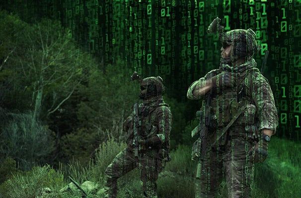 Soldiers on battlefield with green data behind them