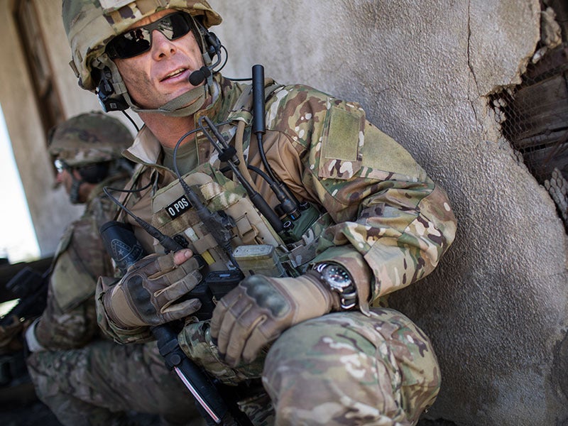 Soldier with PRC-163 radio using Wraith™ waveform for resilient communications 