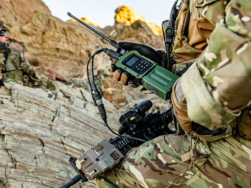 Soldier with PRC-171 radio using Wraith™ waveform for resilient communications 