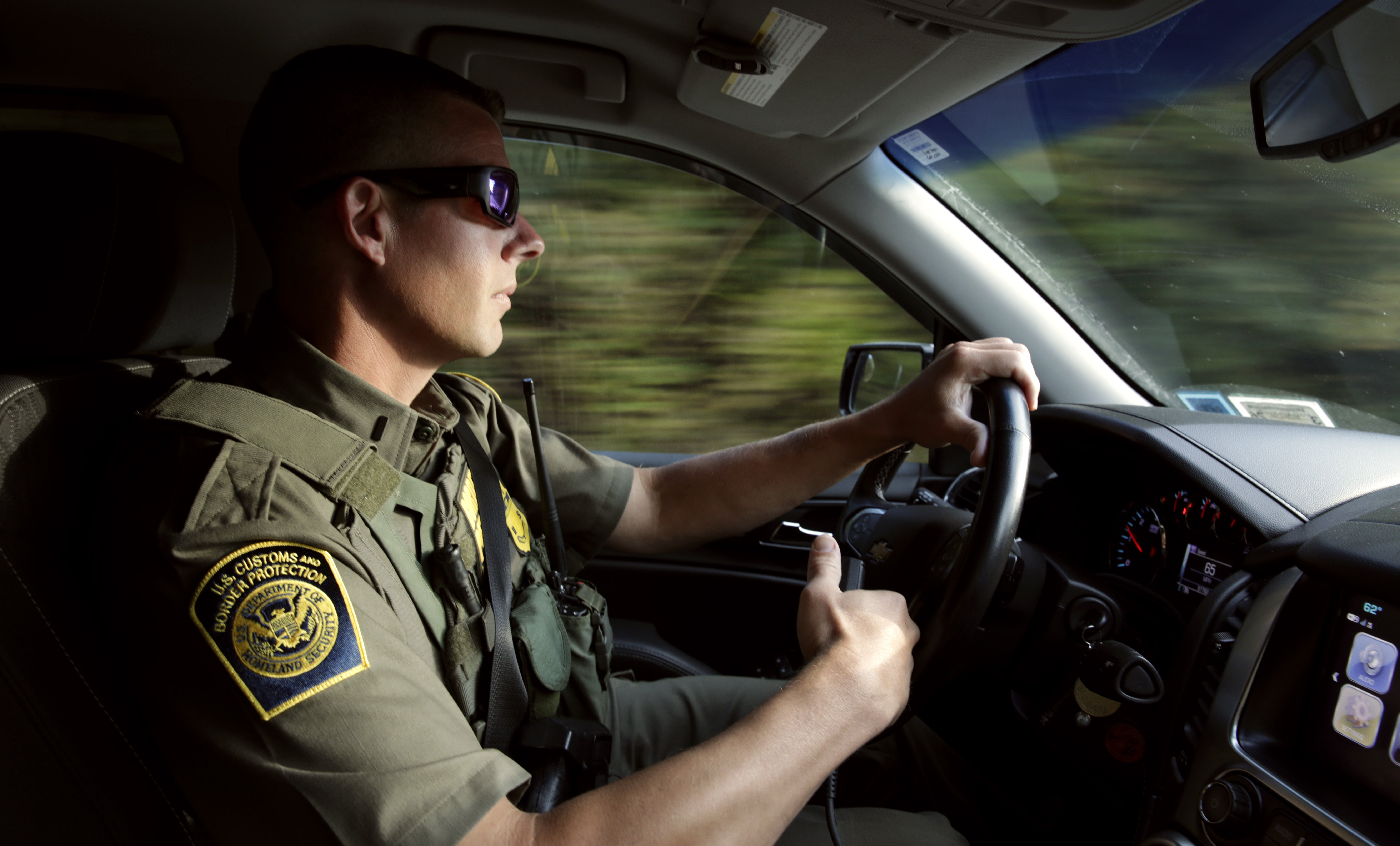 US Border Patrol officer in vehicle