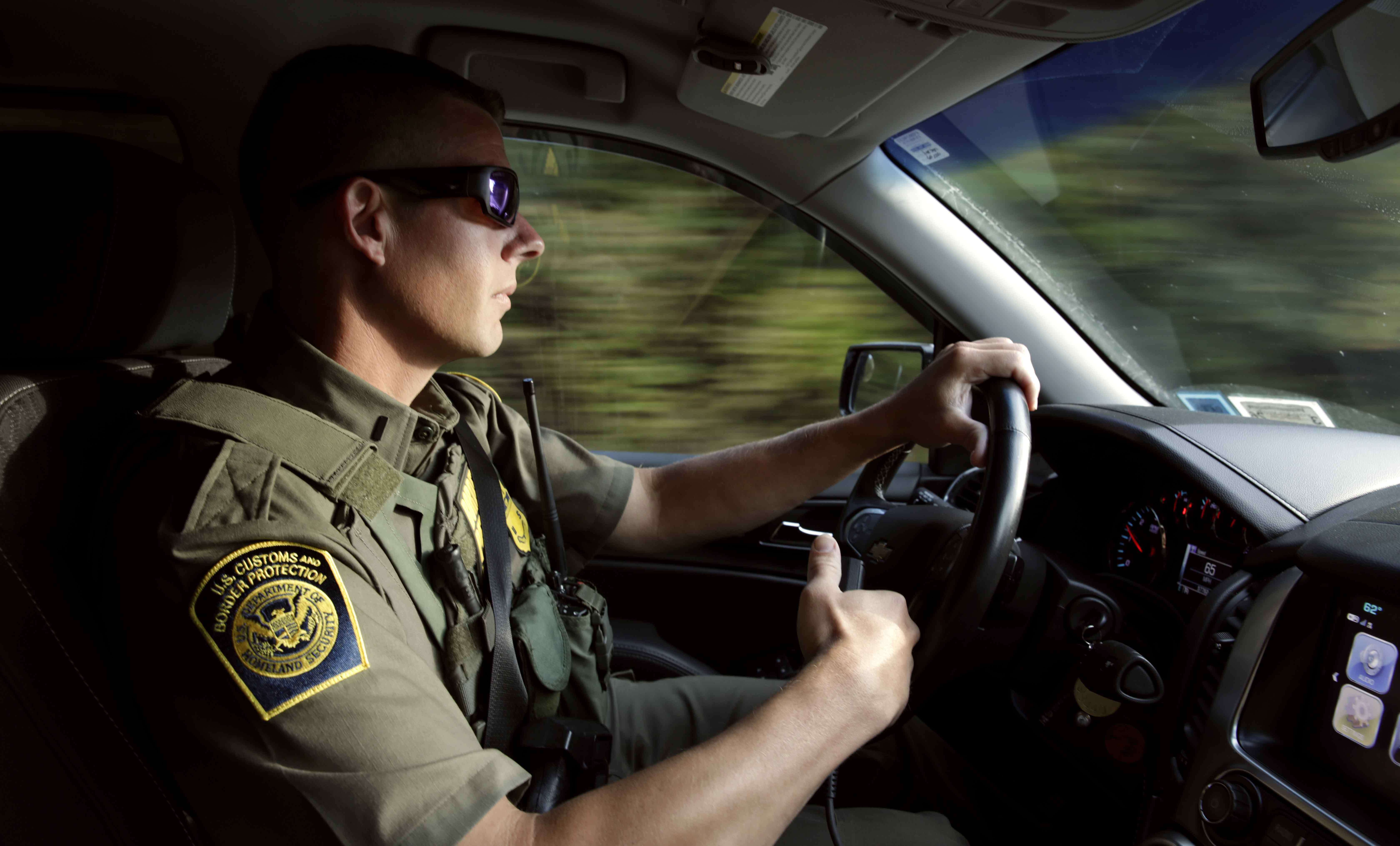 US Border Patrol officer in vehicle