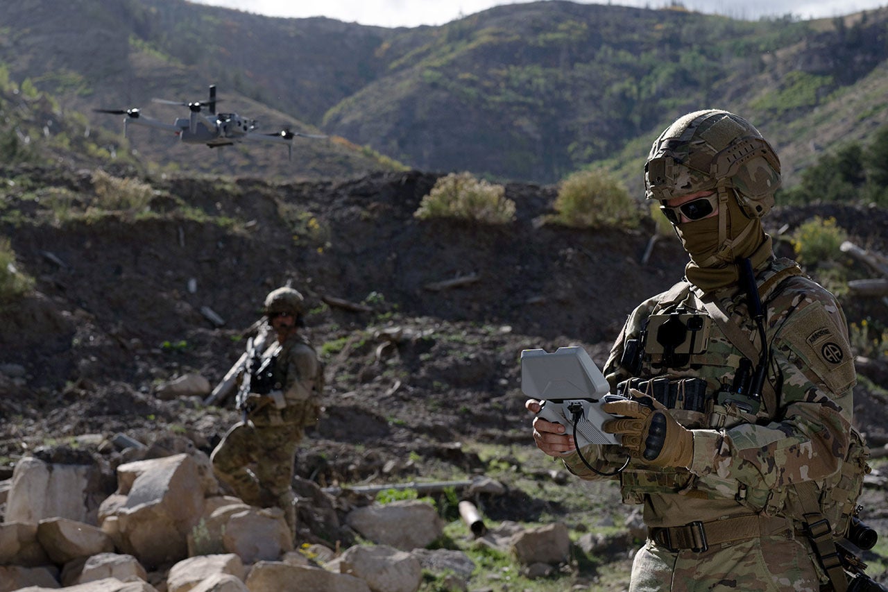 Soldier with drone for communications integrated data layer