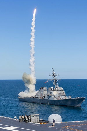 The Arleigh-Burke class guided-missile destroyer USS Ross (DDG 71) fires a Standard Missile 2 (SM-2) during the Titans of the Sea Presidential Review. The Titans of the Sea Presidential Review is one of many events taking place throughout the country to showcase maritime capabilities as part of the U.S Navy’s 250th birthday. America is a maritime nation.