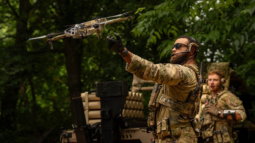soldier launching Skydio autonomous drone
