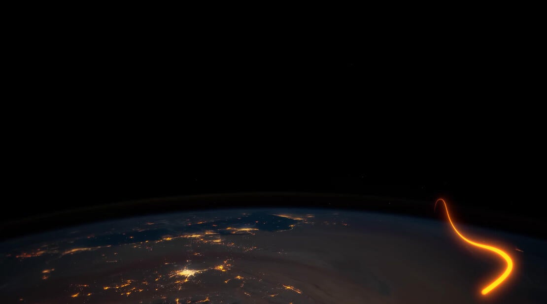 a hypersonic missile glides over the earth at night