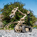 t4 robot raises its arm