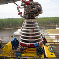 NASA Stennis teams conducted a successful lift onto the Fred Haise Test Stand of RS-25 engine No. E20001, the first of 24 new production engines. Photo credit: NASA Stennis.