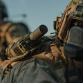 Soldier with radio in the field