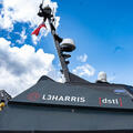 Top of the Defence Science and Technology Laboratory’s MAST-13 uncrewed surface vehicle (USV) where L3Harris' advanced Distributed Spectrum Collaboration and Operations (DiSCO) technology is showcased. Thumbnail image