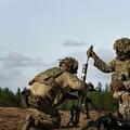 Soldiers load mortar