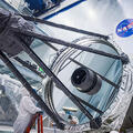 Optical Engineer Bente Eegholm performs and inspection of Roman's Primary mirror. This was taken shortly after it was lifted out of the shipping container. Credit: NASA/Chris Gunn.