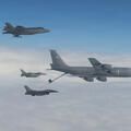 U.S. Air Force KC-135 Stratotanker conducts mid-air refueling for a F-16 Fighting Falcon. Credit: U.S. Air Force