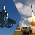 A jet flies through the air and a missile launches from a ground launcher