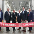 Ribbon cutting ceremony with company executives