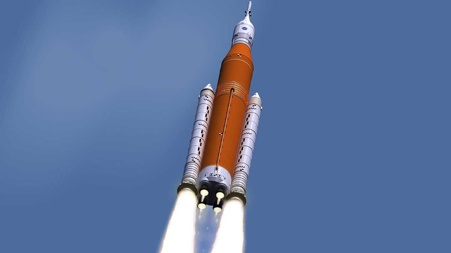 The Space Launch System (SLS) rockets up the sky