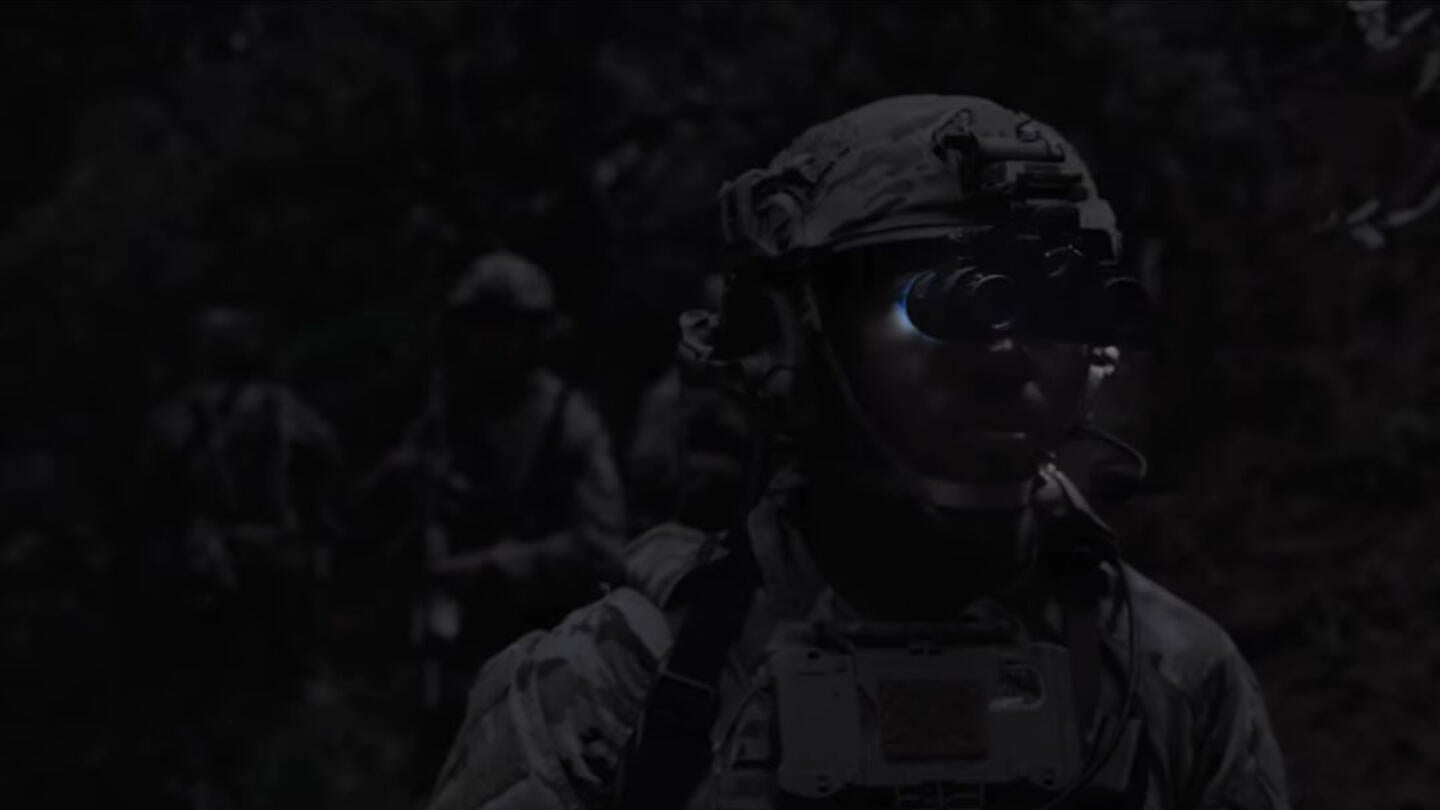 Hyper-enabled warfighter wearing night vision goggles