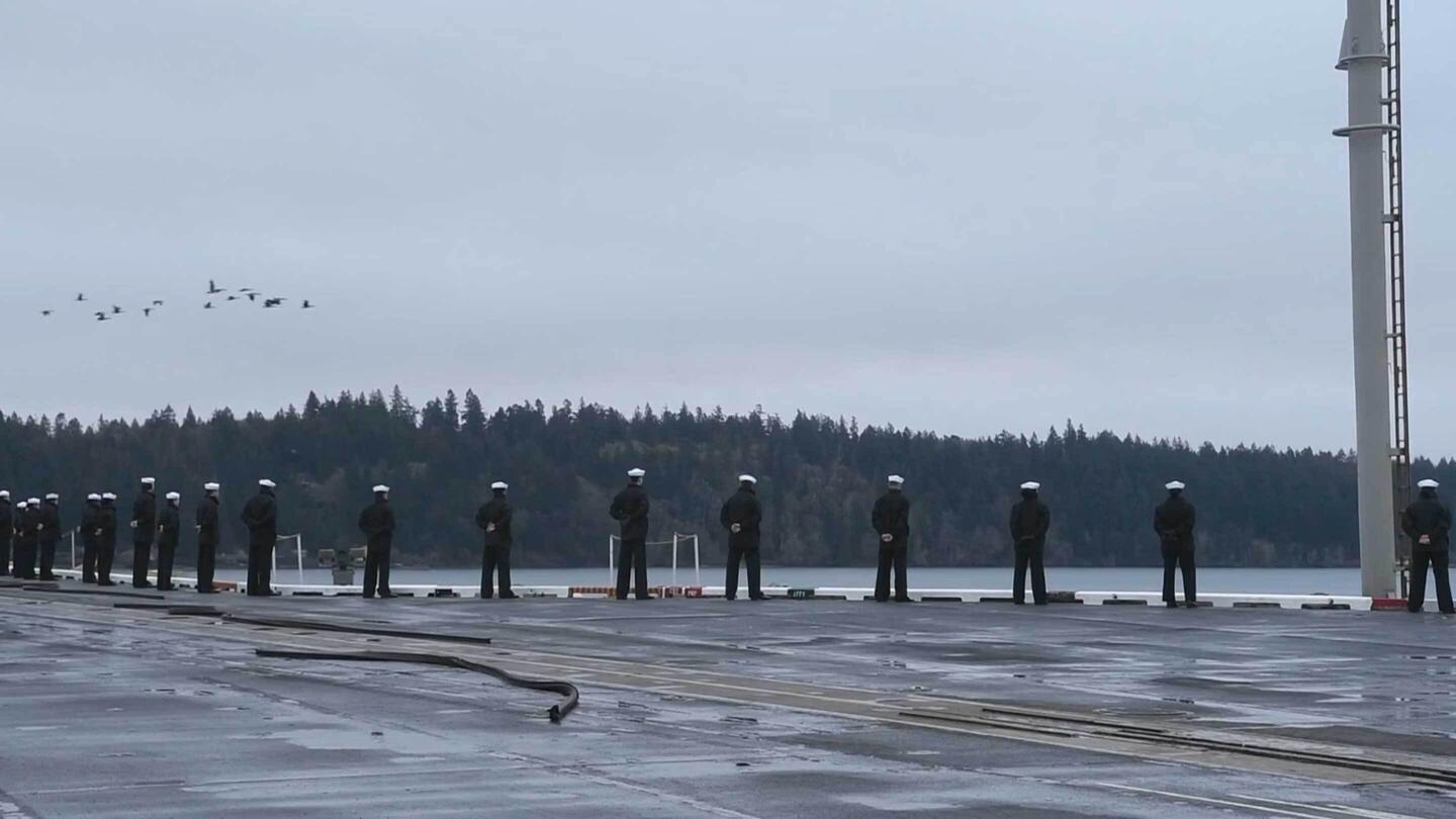 Navy personnel on boat