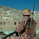 Soldier wearing handheld Falcon® Radio