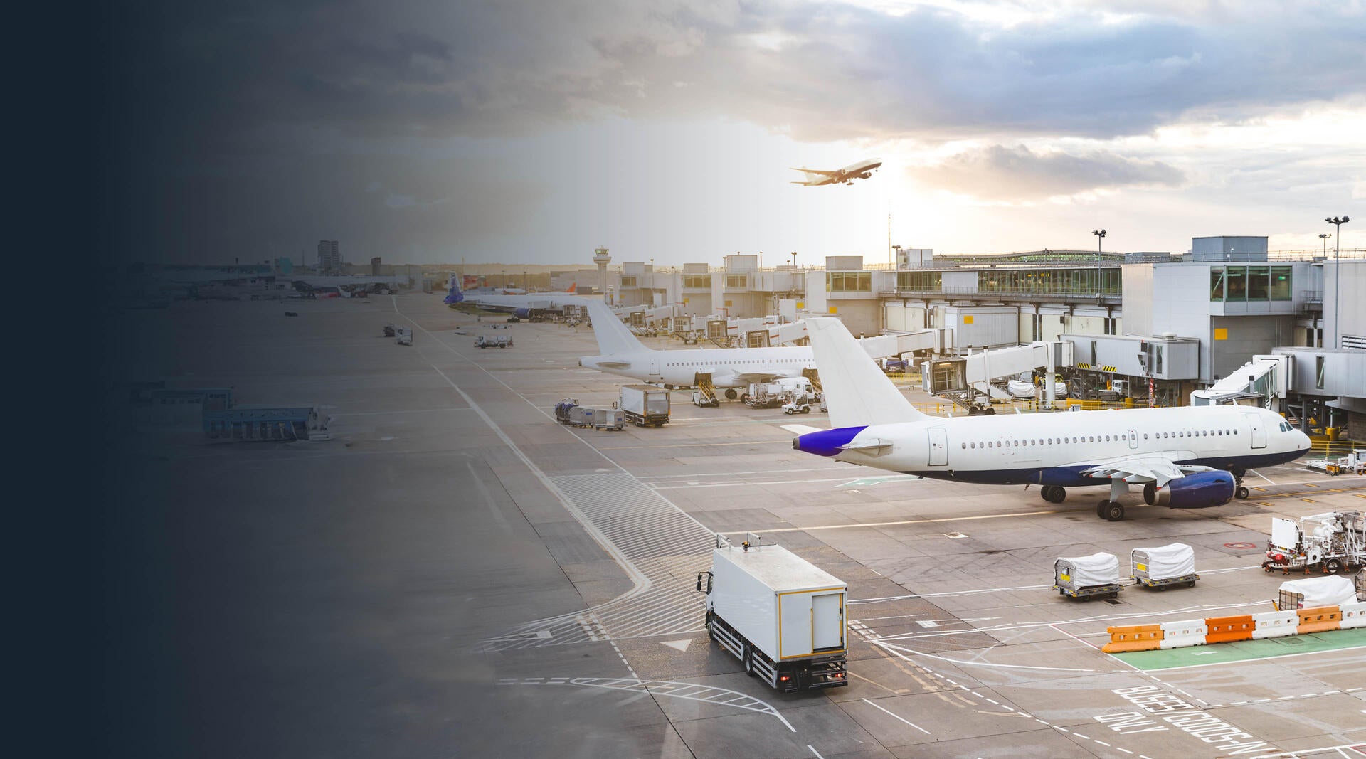 busy commercial airport with planes waiting at gates