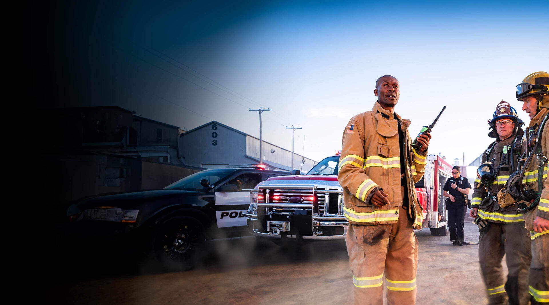 Firefighters at scene use radios