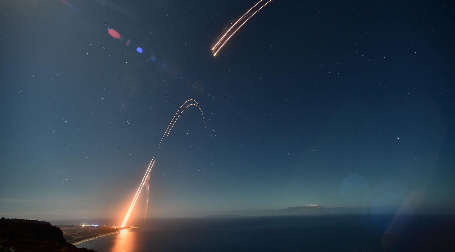 Two ballistic targets soar into the night sky at Pacific Missile Range Facility Barking Sands in Kauai on July 24, 2021.