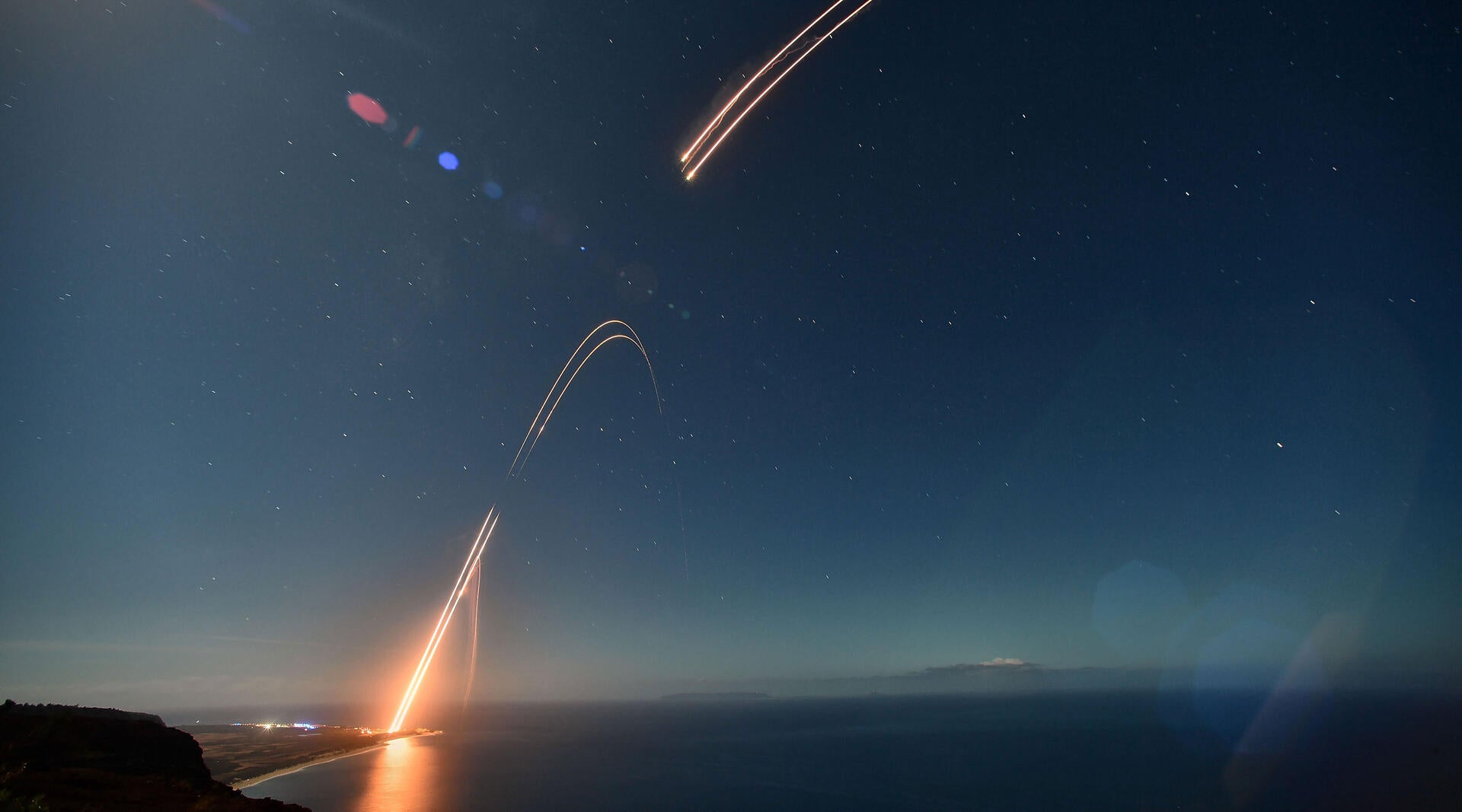 Two ballistic targets soar into the night sky at Pacific Missile Range Facility Barking Sands in Kauai on July 24, 2021.