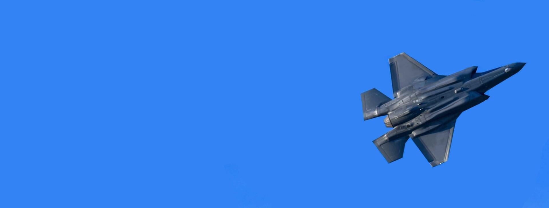 U.S. AIR FORCE ACADEMY, Colo. – Two F-22 Raptors perform a flyover and air demonstration during noon meal formation at the U.S. Air Force Academy in Colorado Springs, Colo., April 12, 2023. Events such as these aim to cultivate warrior ethos, a future-focused mindset, and supplement existing character, leadership, and officer development efforts with the cadets. (U.S Air Force Photo by Trevor Cokley)