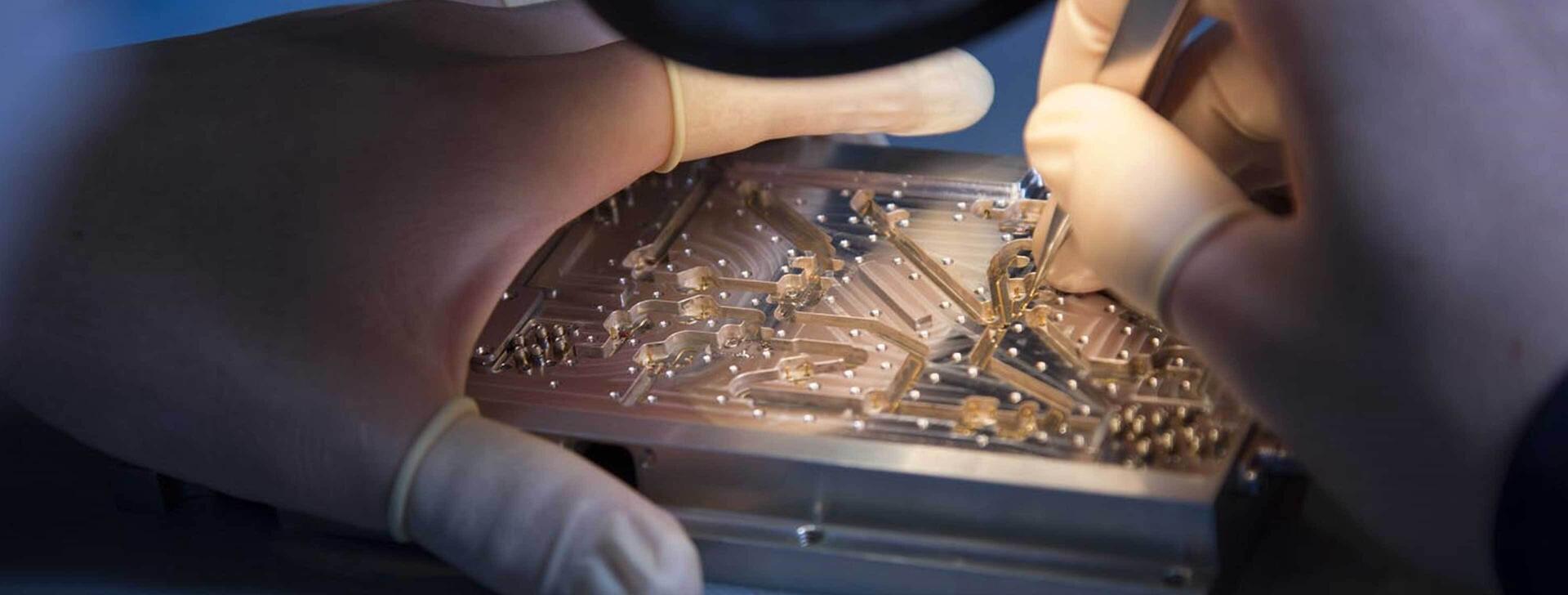 Worker focused on circuit