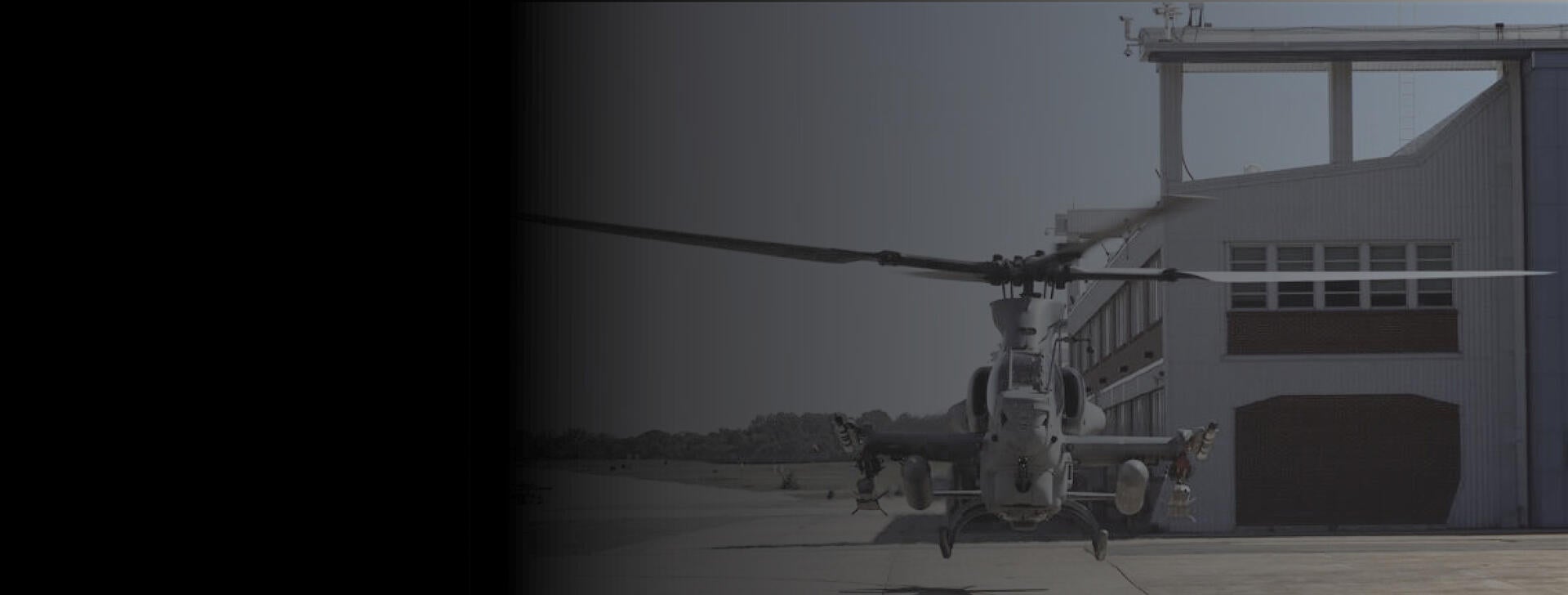 Helicopter near a hangar