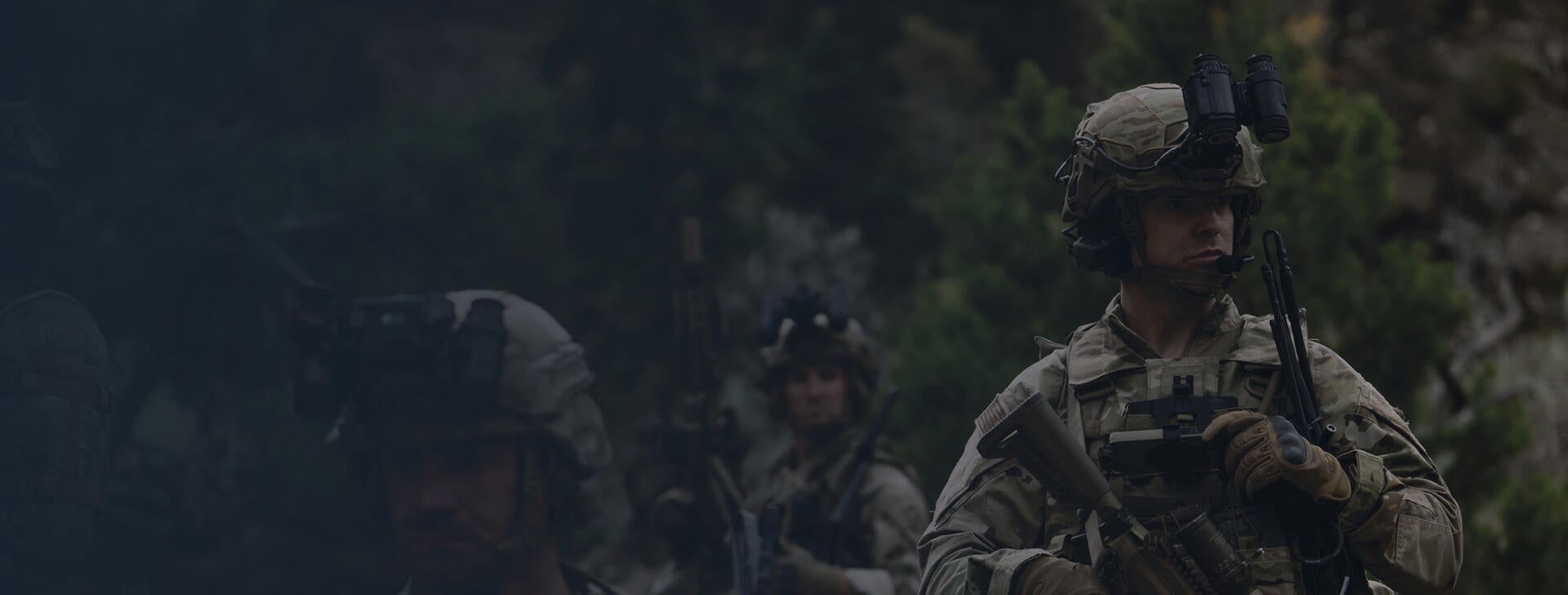 Soldiers in battlefield adjust their radios