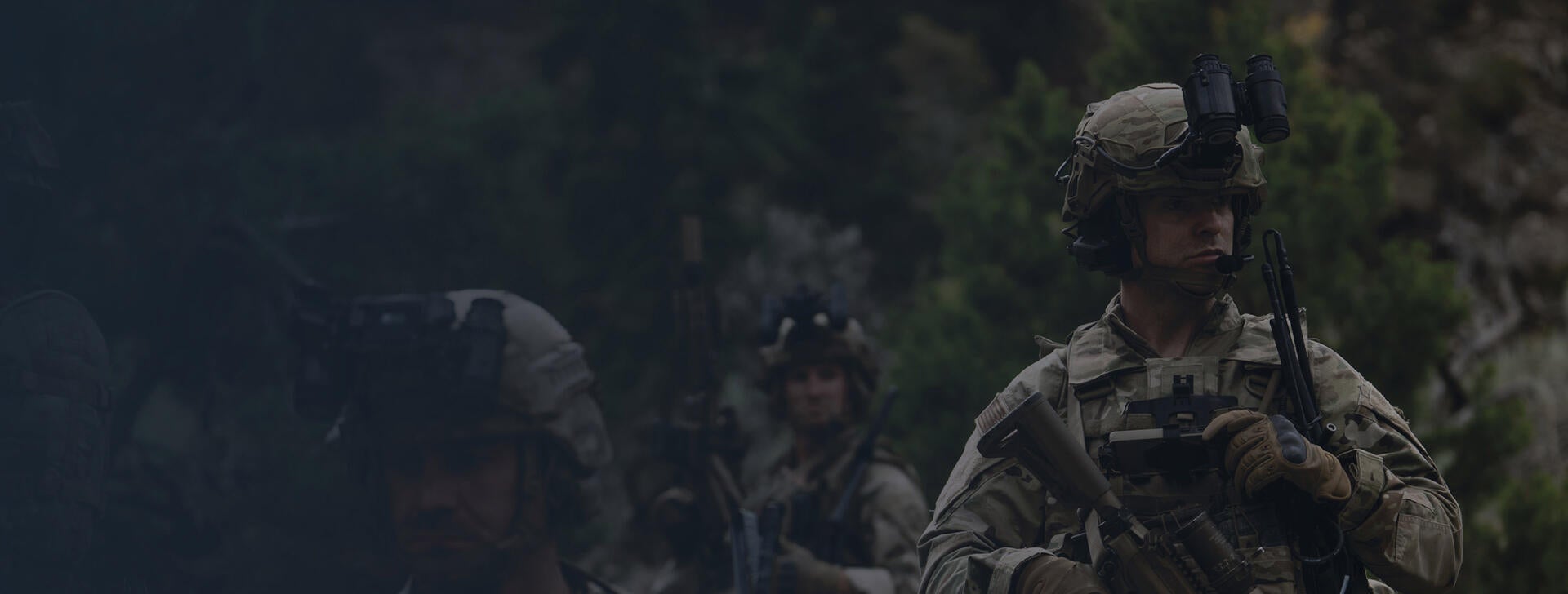 Soldiers in battlefield adjust their radios