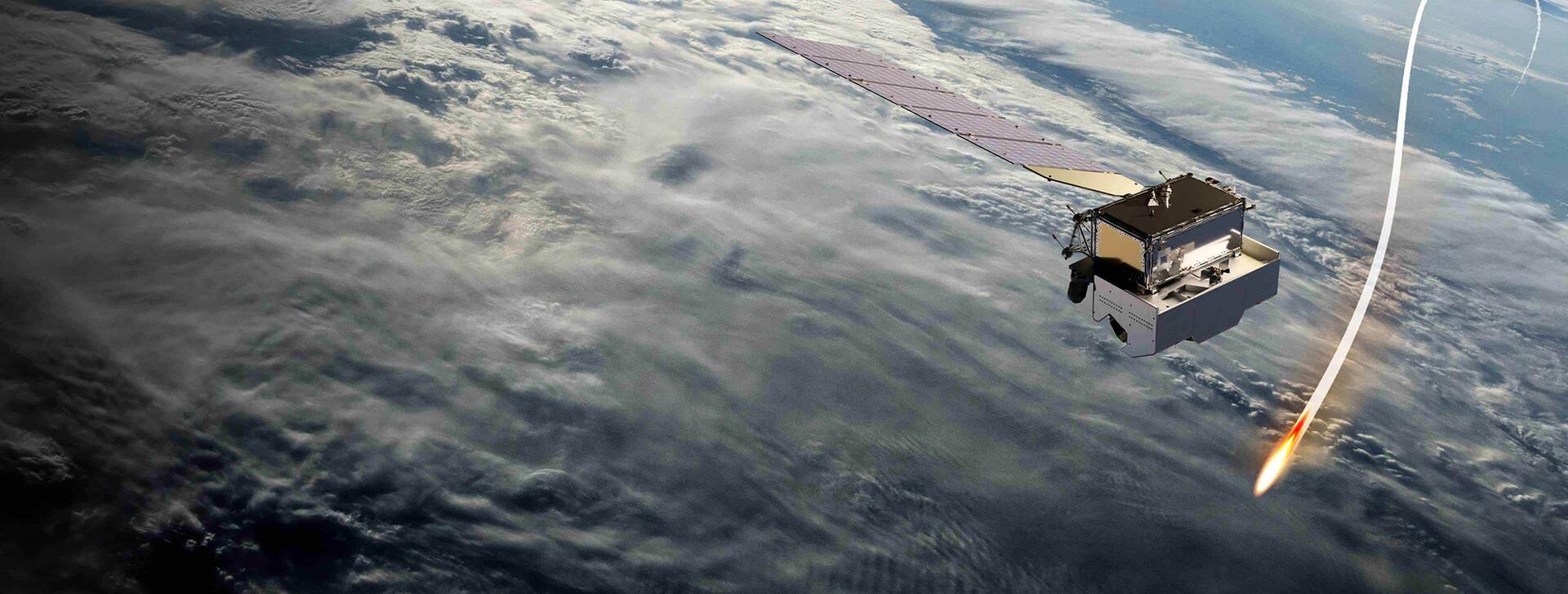 Satellite hovers above atmosphere with missile passing by