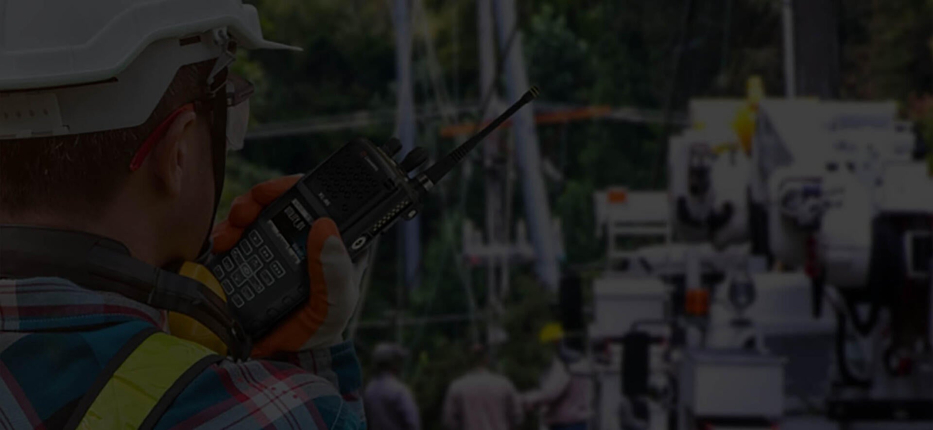 utility worker with portable radio