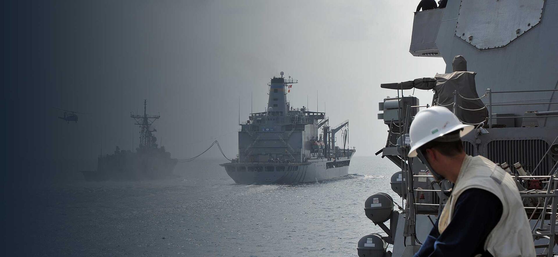 Ensign Ian Schnur, assigned to the Arleigh Burke-class guided-missile destroyer USS McCampbell (DDG 85), watches as the Military Sealift Command fleet replenishment oiler USNS Pecos (T-AO-197) conducts a replenishment at sea with the guided-missile frigate USS Vandegrift (FFG 48). (U.S. Navy photo by Mass Communication Specialist Seaman Declan Barnes) Pacific patrol 