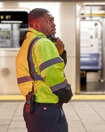 Transportation worker with XL-150P radio