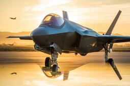 The sun sets behind an Australian F-35A Lighting II at Luke Air Force Base, Ariz., June 27, 2018. The first Australian F-35 arrived at Luke in December, 2014. Currently six Australian F-35's are assigned to the 61st Fighter Squadron where their pilots train alongside U.S. Air Force pilots. (U.S. Air Force photo by Staff Sgt. Jensen Stidham)