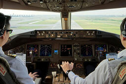 FAA Data Communications Pilots at controls in cockpit thumbnail image