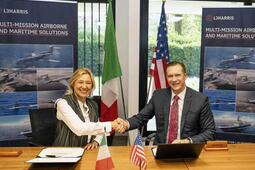 Executives shake hands