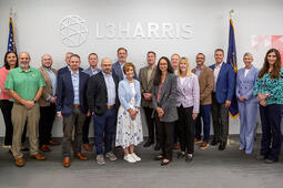 Group photo of Indiana Congressional delegation staff welcomed by L3Harris staff at L3Harris' Fort Wayne manufacturing facility