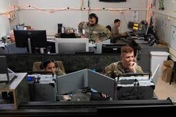 Soldiers in comms room