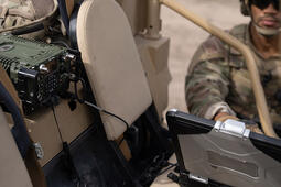 Soldier using laptop with NGC2 at mobile TOC