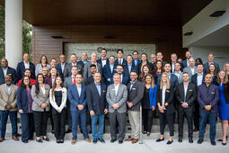 Group of leaders and employees gathered for awards ceremony