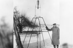 Dr. Robert H. Goddard and a liquid oxygen-gasoline rocket in the frame from which it was fired on March 16, 1926, at Auburn, Massachusetts. Credit: NASA