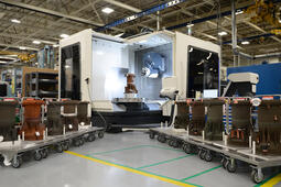 3D printed RL10 rocket engine combustion chambers shown in the manufacturing area at L3Harris’ facility in West Palm Beach, Florida.