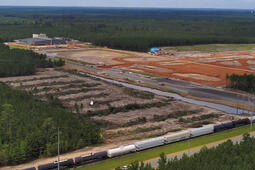 Construction crews continue work on expanding a facility in Arkansas